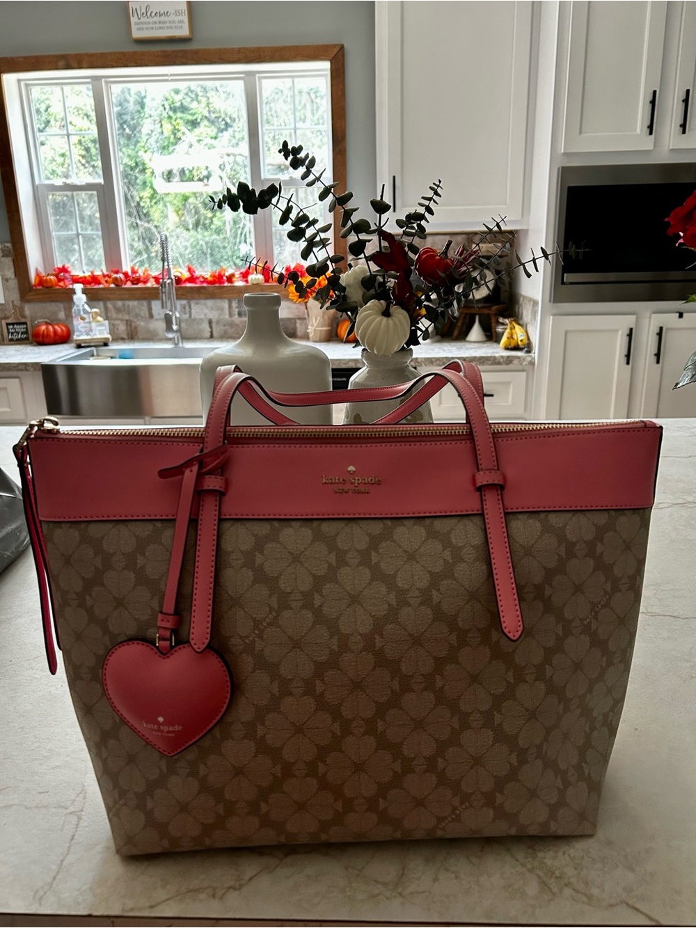 kate spade Brown Signature Tote with Pink Trim & Heart Charm